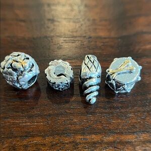 Bundle of silver Pandora-style beads